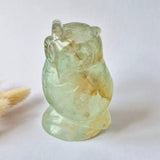 Fluorite owl carving, pale green gemstone with natural color variation, 525g