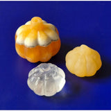 Calcite crystal carved pumpkin trio, 35mm each: orange-white striped, pale yellow, and clear.