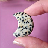 Dalmatian Jasper crescent moon palmstone by Moonlight Gemstones, white with black spots