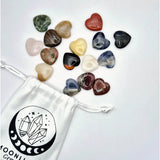 Mini Heart pocketstone set by Moonlight Gemstones; 15 heart-shaped stones in mixed colors with a drawstring pouch.