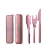 green-goose bio-based cutlery set in pink speckled finish; includes spoon, fork, knife and two pink cases.