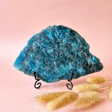 XXL Blue Apatite Disc on Stand, crystalline surface, pink backdrop