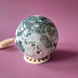 Moss agate geode sphere, 90mm, green druzy crystals with white matrix