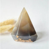Druzy gray agate standing crystal pyramid with gradient gray body and brown base inclusions, 314 g on display