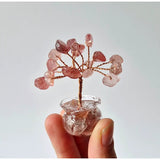 Mini gemstone money tree (5 cm) with pink rose quartz chips on copper wires in a clear glass base