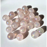 Rose quartz Angel Aura gemstone spheres, iridescent pink 2–3 cm, group of spheres