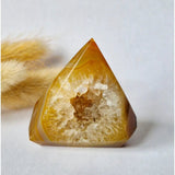 Druzy agate standing geode with amber outer shell and white crystal interior