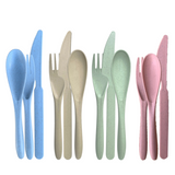 green-goose bio-based Bestekset – 4 pastel color sets in blue, beige, green and pink with spoons, forks and knives.