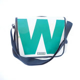 green-goose Rugtas Silnice crossbody bag with large green W graphic on white body and navy strap