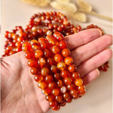 Moonlight Gemstones edelsteen armband met 8mm Sardonyx kralen, oranje