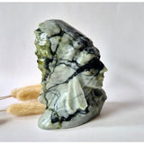 Emerald in matrix Native American carving; Moonlight Gemstones, ~10 cm, ~500 g, green with black veining.