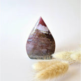 Ocean Jasper druzy teardrop crystal; purple-red banding with clear facets, standing display, 9x6 cm, 219 g