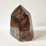 Smoky quartz tower by Moonlight Gemstones, 642 g with deep inclusions
