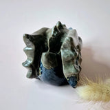 Volcano agate dragon skull sculpture, UV-reactive green-black stone by Moonlight Gemstones, 600 g.
