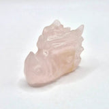 Dragon skull carved from rose quartz by Moonlight Gemstones, 4 cm