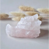 Dragon skull carving in rose quartz by Moonlight Gemstones, 7 cm