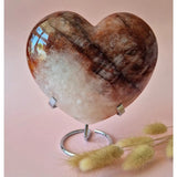 XXL hematoid quartz heart (fire quartz) on metal stand, brown-red bands with white inclusions
