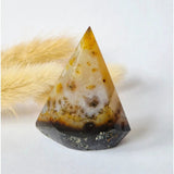 Druzy grey agate crystal pyramid, standing, with yellow-brown inclusions, 46g