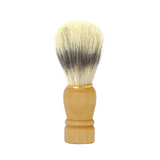 green-goose wooden shaving brush with two-tone natural bristles and a light wood handle