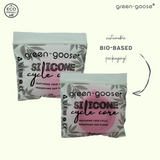 Green-goose silicone menstrual cups with holder and sterilizer, two packs in bio-based packaging.