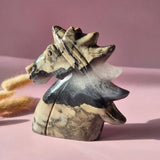 Volcano agate unicorn carving, 501g, UV-reactive beige and black banded statue by Moonlight Gemstones.