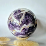 Moonlight Gemstones XL amethyst sphere with white calcite veins, 95 mm, 1128 g