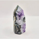 Amethyst agate point with purple druzy crystals and natural banding from Uruguay
