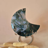 Moonlight Gemstones XL moss agate crescent moon on stand with green and white druzy patterns