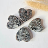 Yooperlite heart-shaped stones, set of 4; speckled gray with pink and black accents, 3–4 cm each