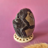 Dragon Stone Septarian druzy egg by Moonlight Gemstones on stand, brown and black with beige veining