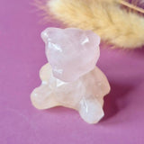 Rose quartz bear crystal carving, 4 cm, faceted pink gemstone sculpture with smooth translucent surfaces.