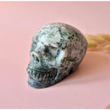 Moonlight Gemstones XL moss agate skull sculpture, white with dark green moss veining, 10 cm, 570 g