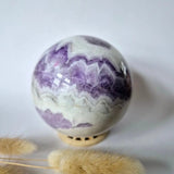 Amethyst gemstone ball by Moonlight Gemstones, 87 mm, purple banded sphere on wooden stand