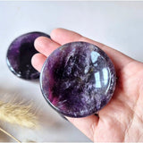 Two amethyst gemstone dishes, round purple crystal coasters, each 5-6 cm