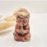 Pink sesame stone Buddha figurine with white and yellow flecks, 5 cm tall