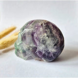 Fluorite skull gemstone in purple and green hues, polished specimen by Moonlight Gemstones