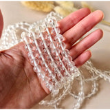 Edelsteen armband bergkristal met 8 mm ronde kralen, meerdere kristalstrengen