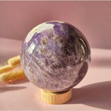 XL Dream Amethyst crystal sphere on a wooden stand; large purple spiritual gemstone for calm and balance