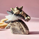 Volcano Agaat unicorn carving by Moonlight Gemstones; black-white marbled agate with translucent mane.