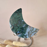 Moss agate crescent moon on stand with metal clamps, green drusy patterns, 184 g