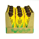 Forever Aloe Vera Gel Minis bottles in yellow cartons, Forever Living brand, displayed in a cardboard tray