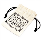 Indiase Runenstenen in Etui – beige canvas pouch with black runic symbols and drawstring
