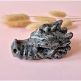 Yooperlite dragon skull carving, 8 cm, Moonlight Gemstones, gray speckled stone with spikes