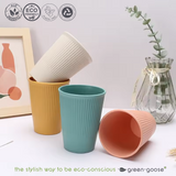 Green-goose bioplastic cups, four ribbed cups in yellow, teal and peach; 28-piece set