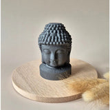 Shungite Meditatie Buddha 6cm statue, dark gray shungite on a round wooden base
