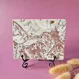 Crazy Lace Agate slab by Moonlight Gemstones on a black metal stand, 318g, white-pink lace with drusy patterns