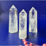 Clear quartz crystal obelisk towers, set of 3, transparent with natural inclusions.