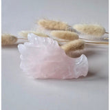 Dragon skull carving in rose quartz by Moonlight Gemstones, 7 cm