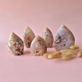 Druzy Roze Amethist freeforms from Moonlight Gemstones; five pink-gray teardrop stones.