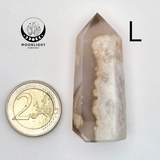 Handmade flower agate tower by Moonlight Gemstones, pink with white inclusions, shown beside a 2-euro coin
